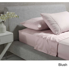 Citta della Pieve blush 1000TC cotton rich sheet set on a bed