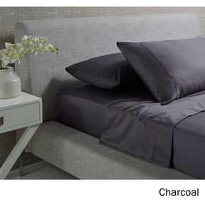 Citta della Pieve charcoal 1000TC cotton rich sheet set on a bed