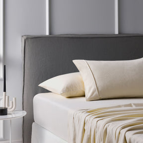 Bettona stone brushed cotton flannelette sheet set on a winter bed