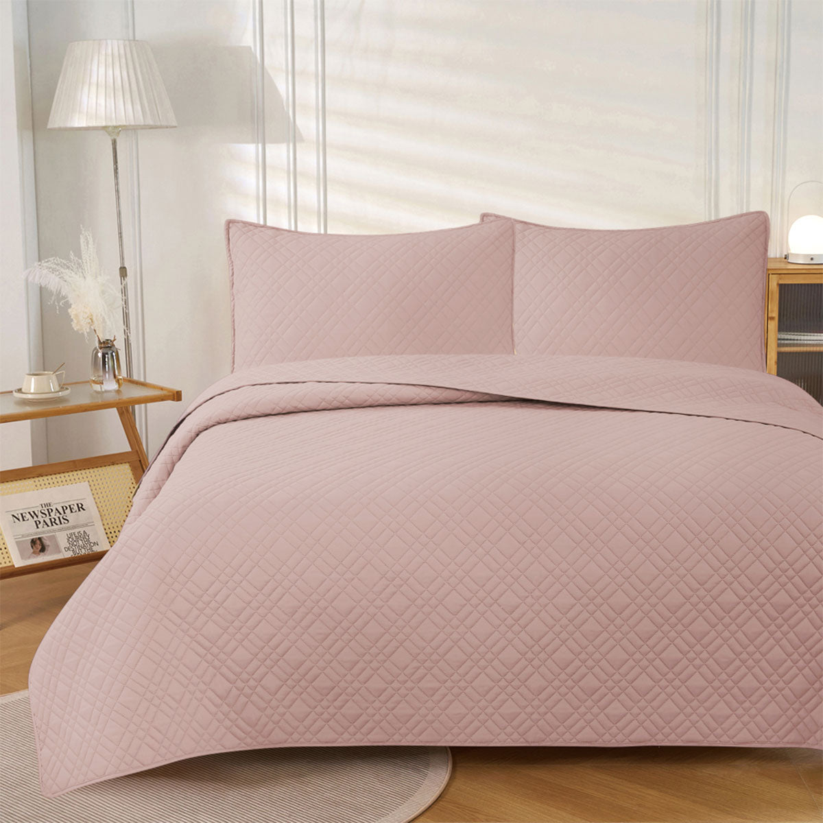 Frampton on Severn blush embossed reversible coverlet on a Queen bed