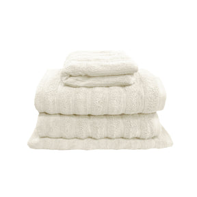 Snow white four piece cotton towel set with two bath towels, hand towel and bath mat