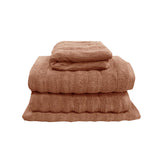Terracotta four piece cotton towel set with two bath towels, hand towel and bath mat