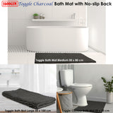 Close up of the toggle applique pattern on the charcoal microfibre bath mat