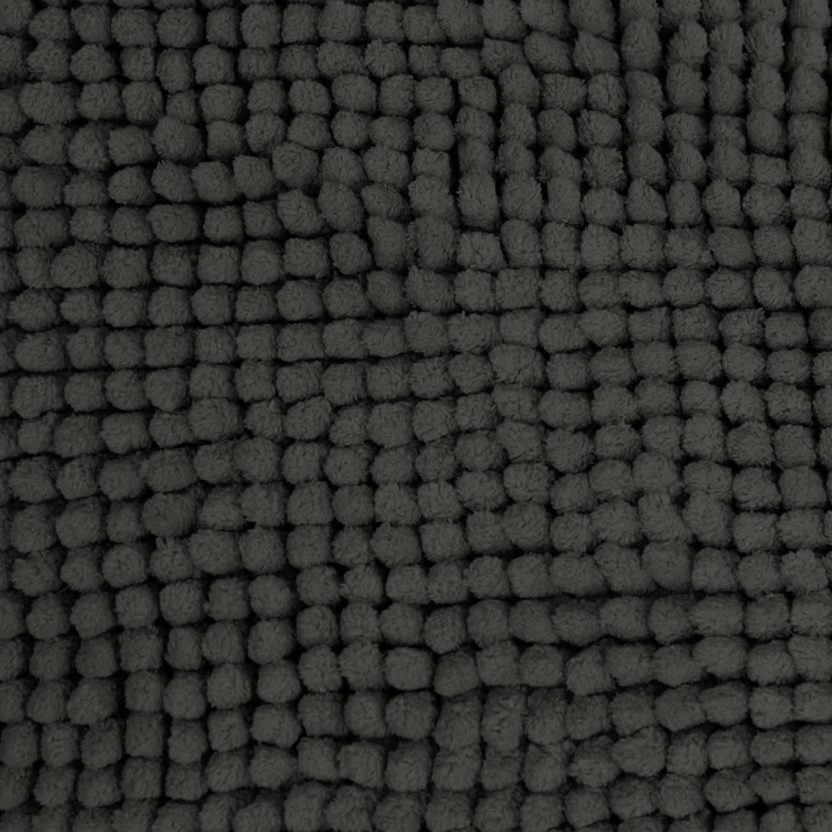 Charcoal microfibre bath mat shown beside a bath with its non slip backing on tile
