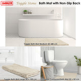 Close up of the applique texture on the stone microfibre bath mat