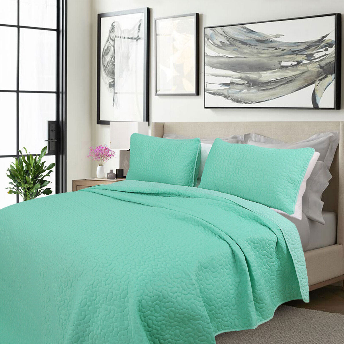 Carnival glass embroidered cooling comforter with two pillowcases on a Queen bed