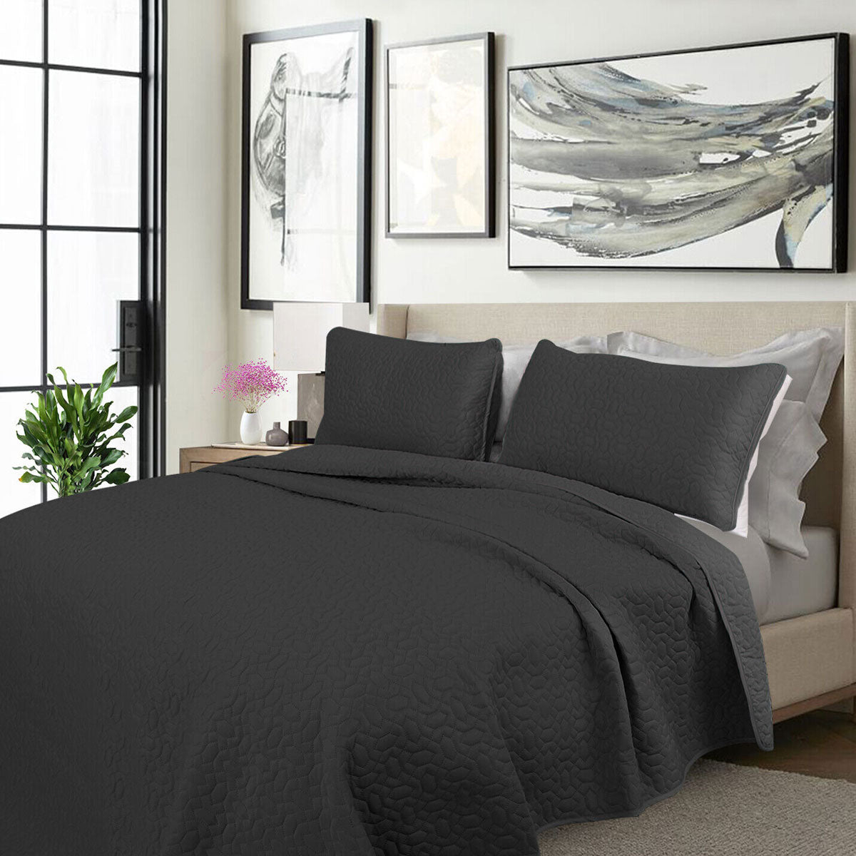 Kineton charcoal cooling embroidered comforter set on a King bed with two pillowcases