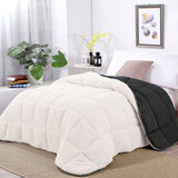 Charcoal sherpa fleece reversible comforter with two pillowcases on a Queen bed