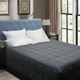 Charcoal box end quilt with lofty cassette stitching on a Double bed