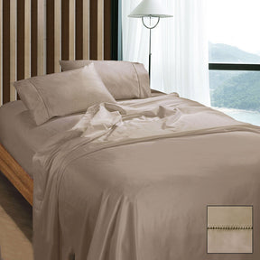 Gubbio doeskin 1100TC Egyptian cotton sateen sheet set on a bed