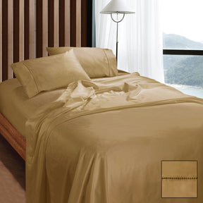 Gubbio latte 1100TC Egyptian cotton sateen sheet set on a bed