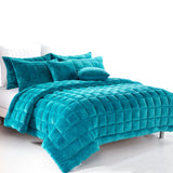 Sherborne emerald green faux mink quilted comforter set on a King bed with two pillowcases