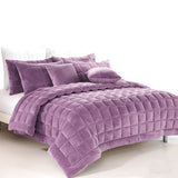 Sherborne lilac faux mink quilted comforter set on a King bed with two pillowcases