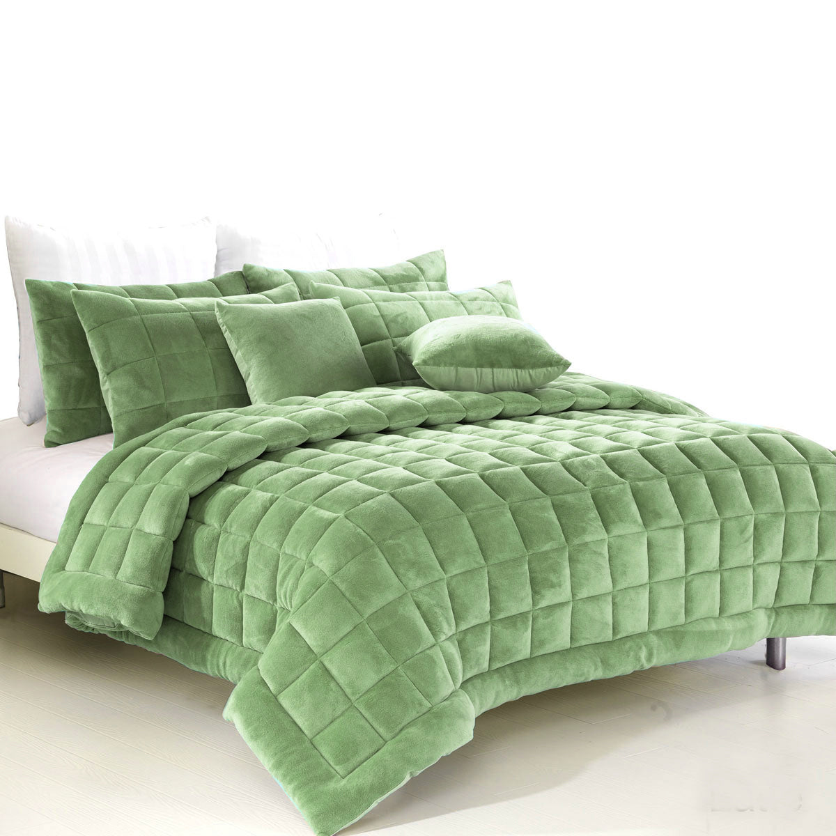 Sherborne sage faux mink quilted comforter set on a King bed with two pillowcases