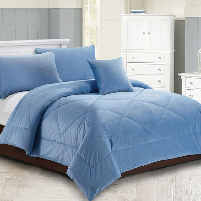 Dowdeswell chambray blue diamond quilted comforter set on a Super King bed with two pillowcases