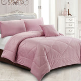 Pink diamond quilted quilt with two pillowcases on a Queen bed