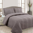 Arlington mocha pintuck quilted coverlet set on a Queen bed with matching pillowcases