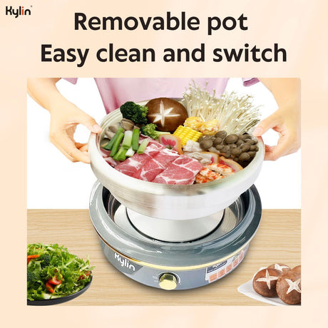 Electric hotpot with glass lid on, showing rotary power control dial on the base