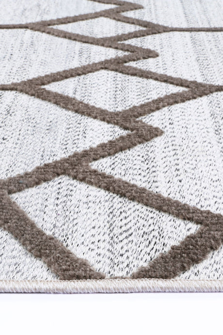 Geometric polypropylene floor rug in cream beige, 160 x 230 cm