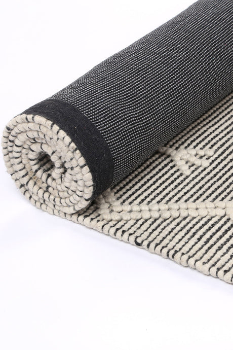 Cream hand tufted wool blend floor rug 240x330cm