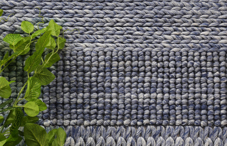 Tribal textured wool blend floor rug in blue, 200x290cm