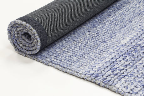 Tribal textured wool blend floor rug in blue, 200x290cm