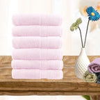 Set of six baby pink combed cotton hand towels, 500 GSM, 40 x 60 cm, folded with dobby border detail