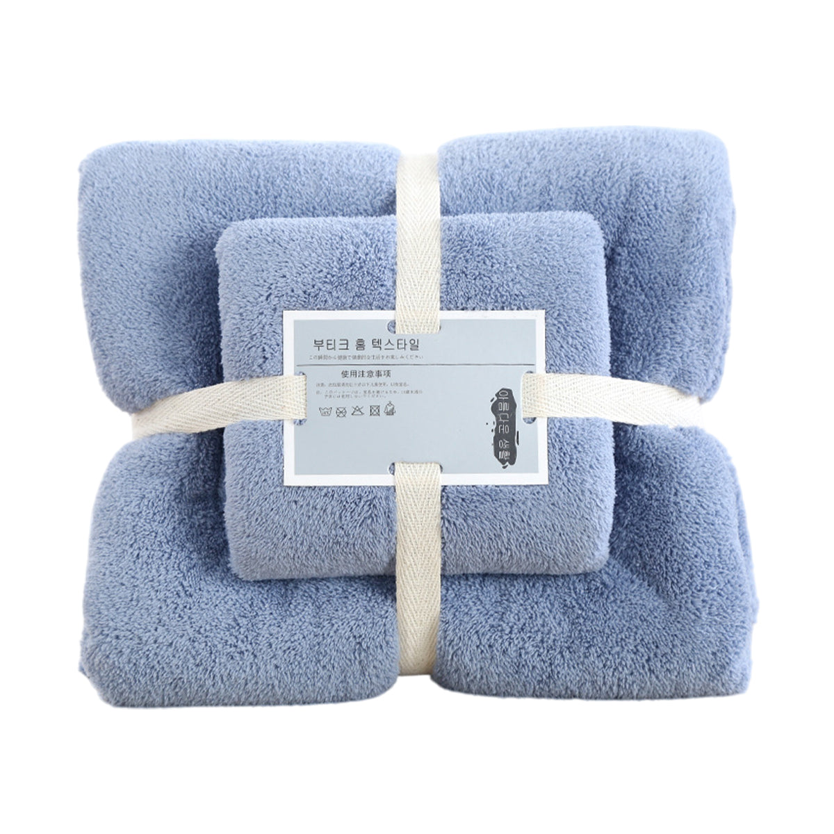 Blue coral fleece towels hanging on a rail to dry