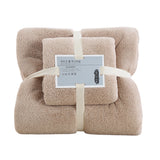 Blue coral velvet towel set styled in a bathroom setting