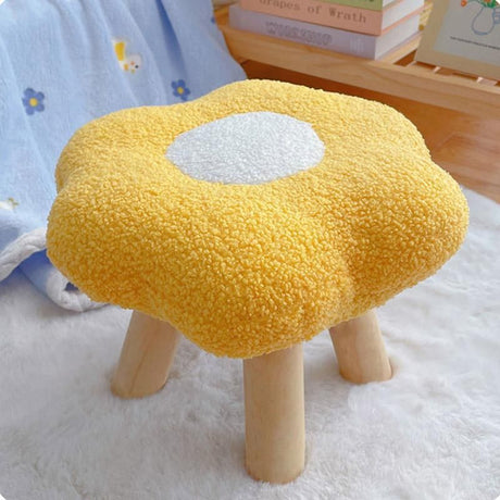 Flower shaped plush footstool in blue