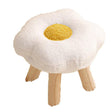White flower shaped plush stool with wooden legs