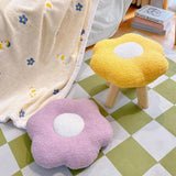 White flower stool in a living room