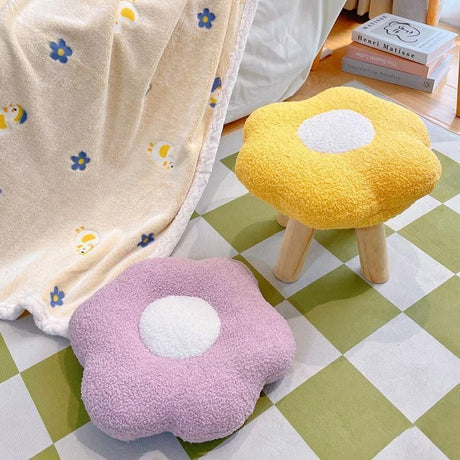 White flower stool in a living room