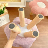 White flower stool used for changing shoes