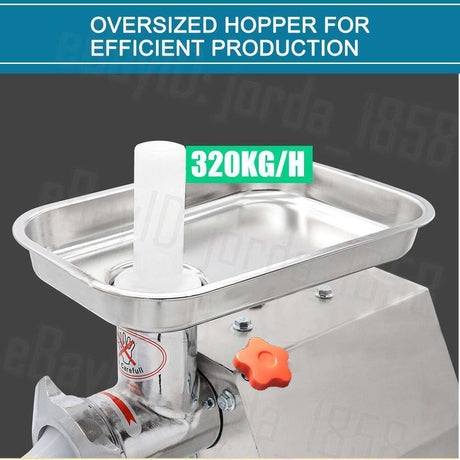 Mince being produced into a tray by the commercial electric meat grinder