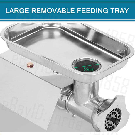 Meat mincer in a commercial kitchen setting on a stainless steel bench