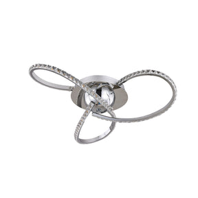 Lerici chrome three light crystal LED ceiling light above a dining table