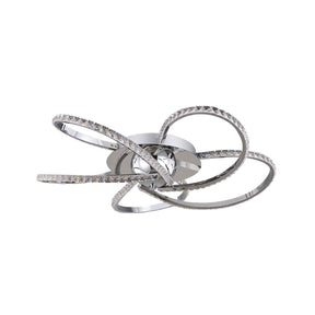 Lerici chrome five light crystal LED ceiling light above a large dining table