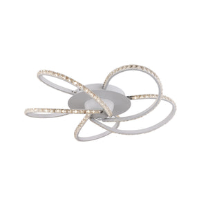 Lerici white five light crystal LED ceiling light above a large dining table