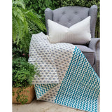 Organic cotton reversible baby quilt in blue little fish print
