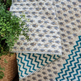 Organic cotton reversible baby quilt in blue little fish print
