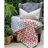 Organic cotton reversible baby quilt in pink pineapple print
