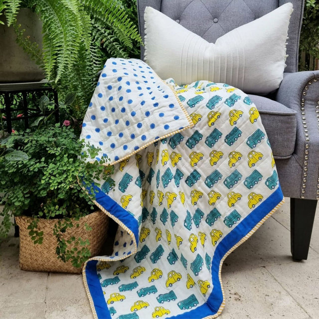 Organic cotton reversible baby quilt in yellow cars print