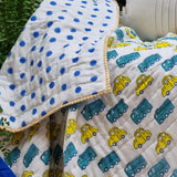 Organic cotton reversible baby quilt in yellow cars print