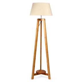 Hollis 155cm bamboo tripod floor lamp with beige linen shade in a living room