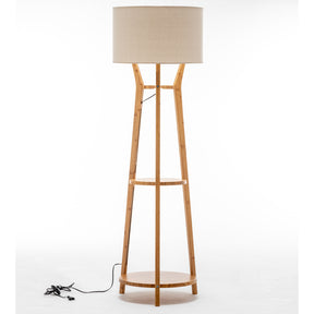 Bamboo tripod floor lamp with linen shade and storage shelves