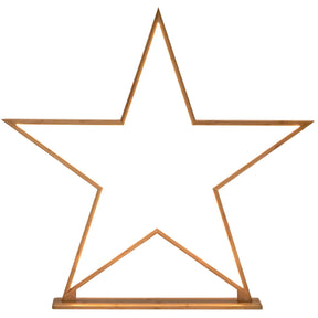 Cosette natural bamboo star table lamp with warm LED glow in a living room corner