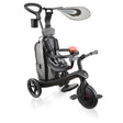 Black and grey 4 in 1 kids trike with canopy and parent handle