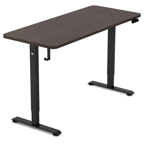 Reid walnut electric standing desk with black frame in a home office