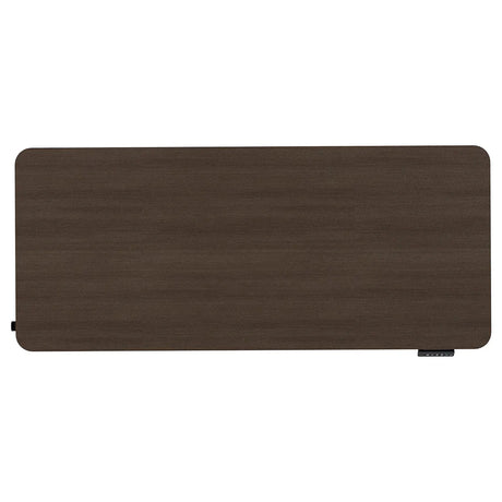 Reid walnut electric standing desk with black frame in a home office